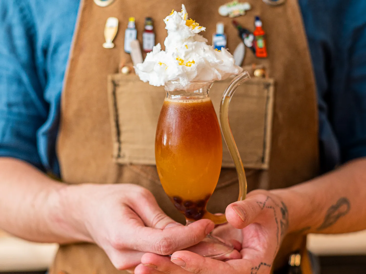 CookHouse — bartender with cocktail