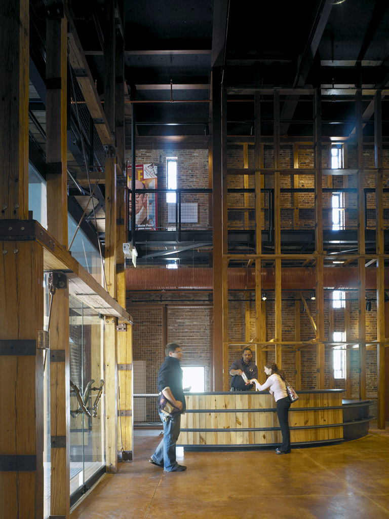 Interior of the American Visionary Art Museum’s Jim Rouse Visionary Center, a restored timber-and-brick warehouse used as event space.